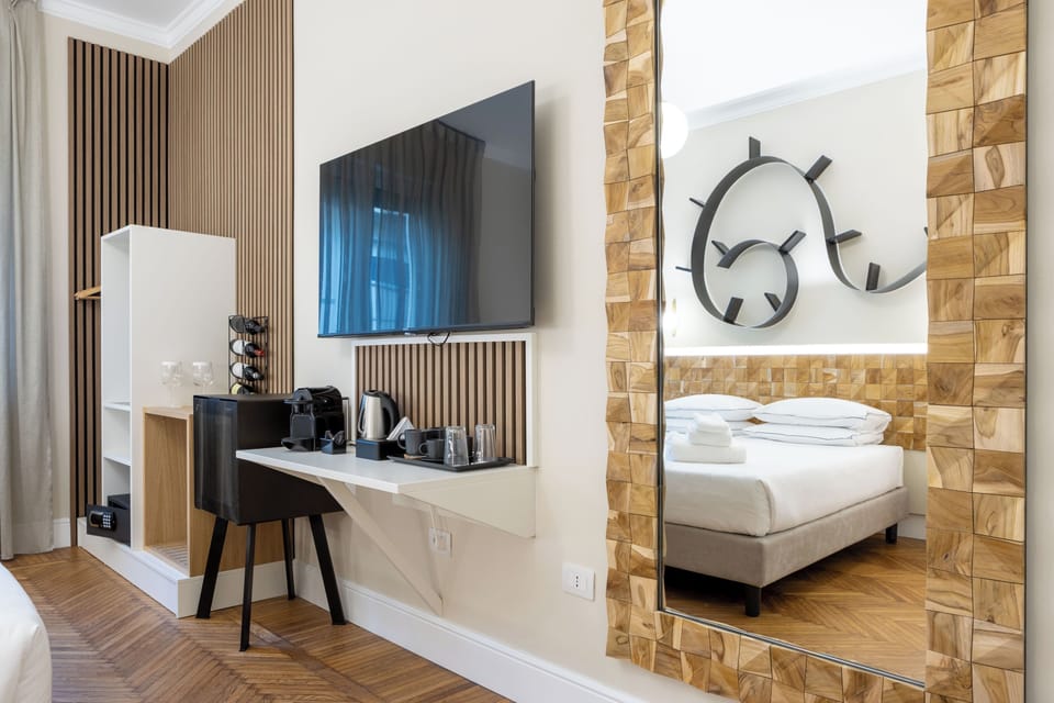Economy Room, 1 Bedroom, Non Smoking, Private Bathroom | Minibar, in-room safe, iron/ironing board, free WiFi