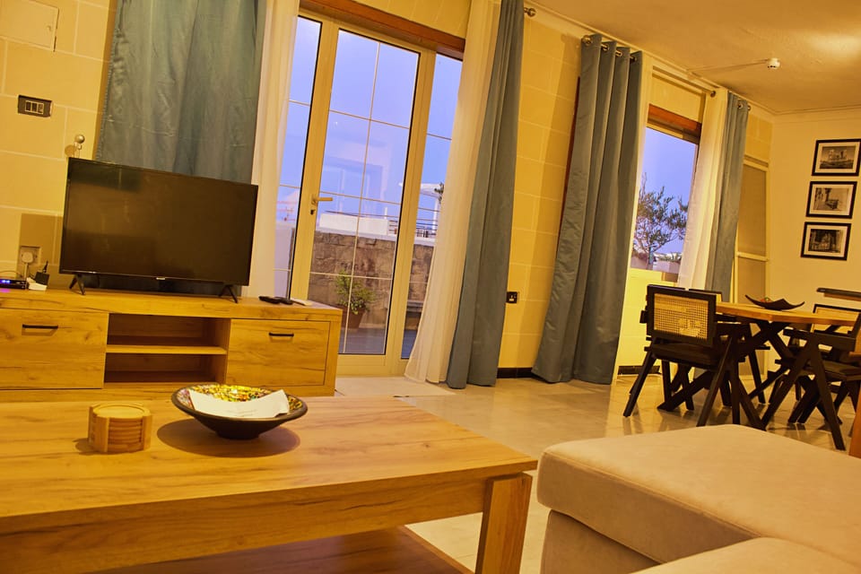 Luxury Penthouse | Living area | 21-inch TV with cable channels