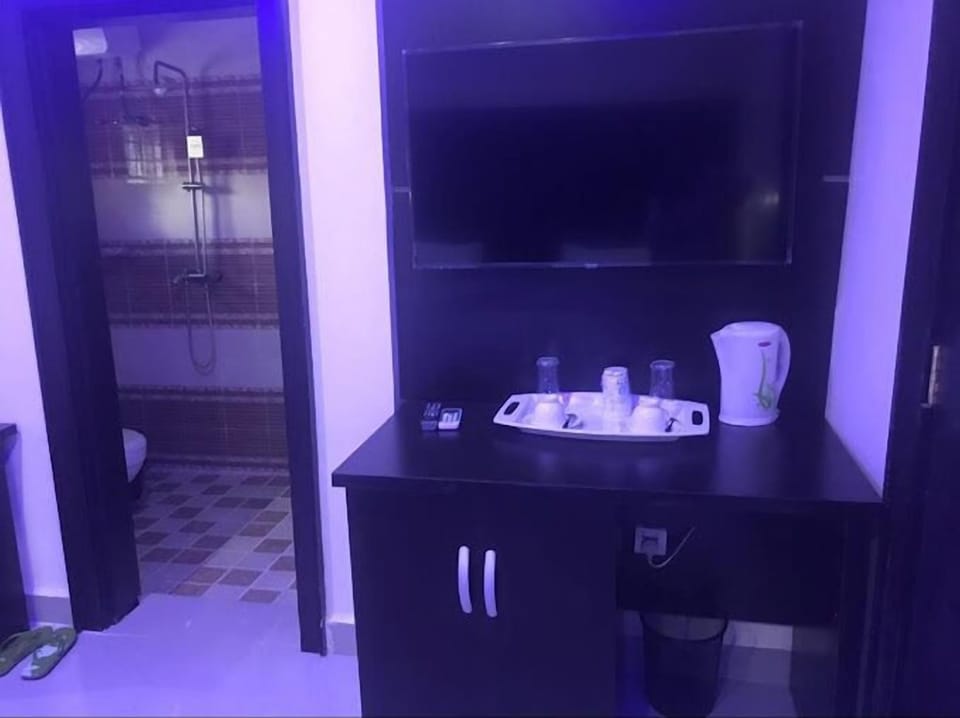 Comfort Room, Balcony, City View | Desk, laptop workspace, free WiFi