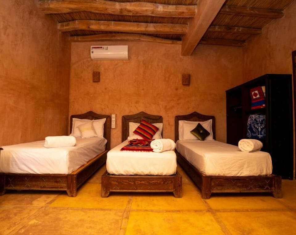 Triple Room | Bed sheets
