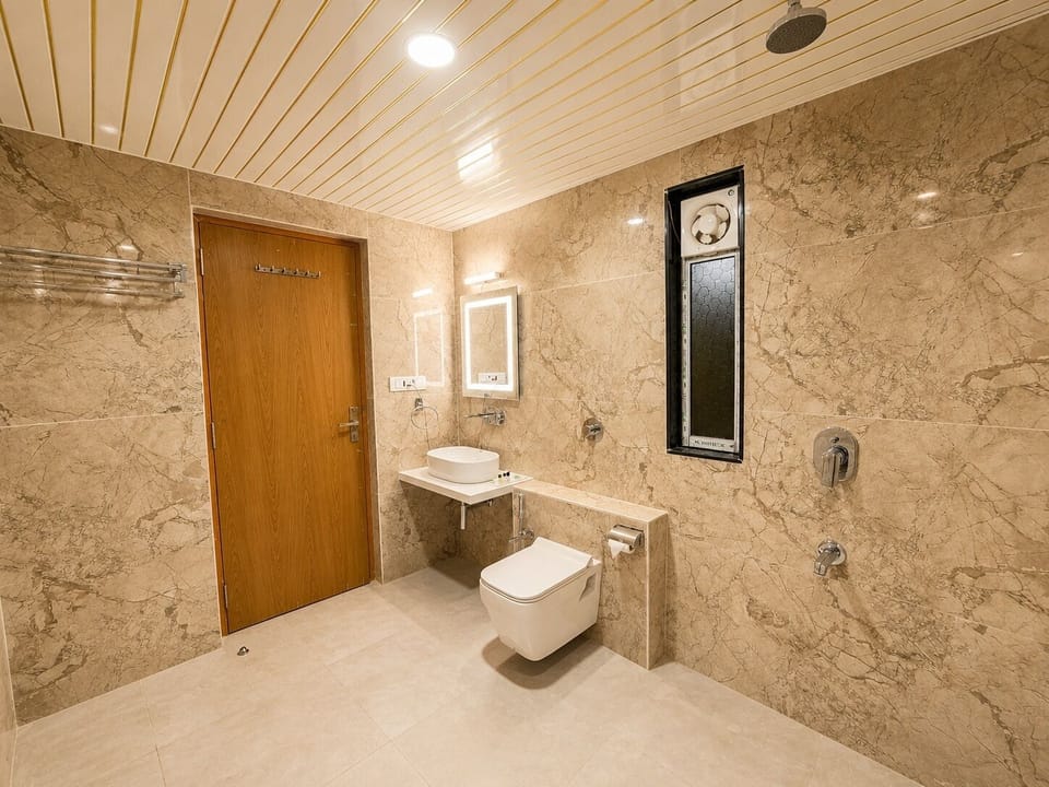 Super Deluxe Room | Bathroom | Shower, free toiletries, slippers, soap