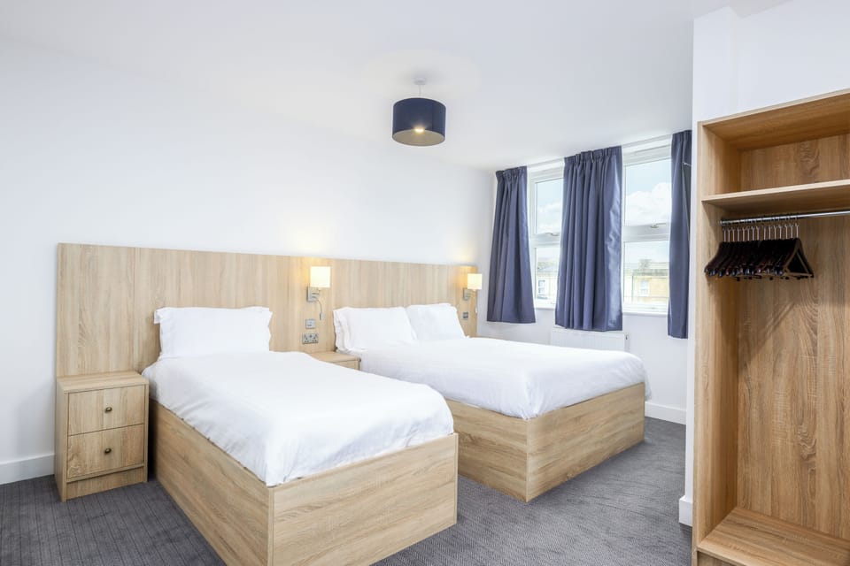 Triple Room, Sea View | Desk, iron/ironing board, free WiFi, bed sheets