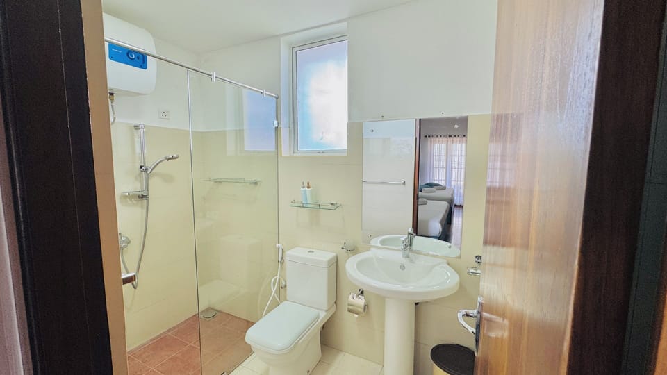 Shower, free toiletries, towels, soap