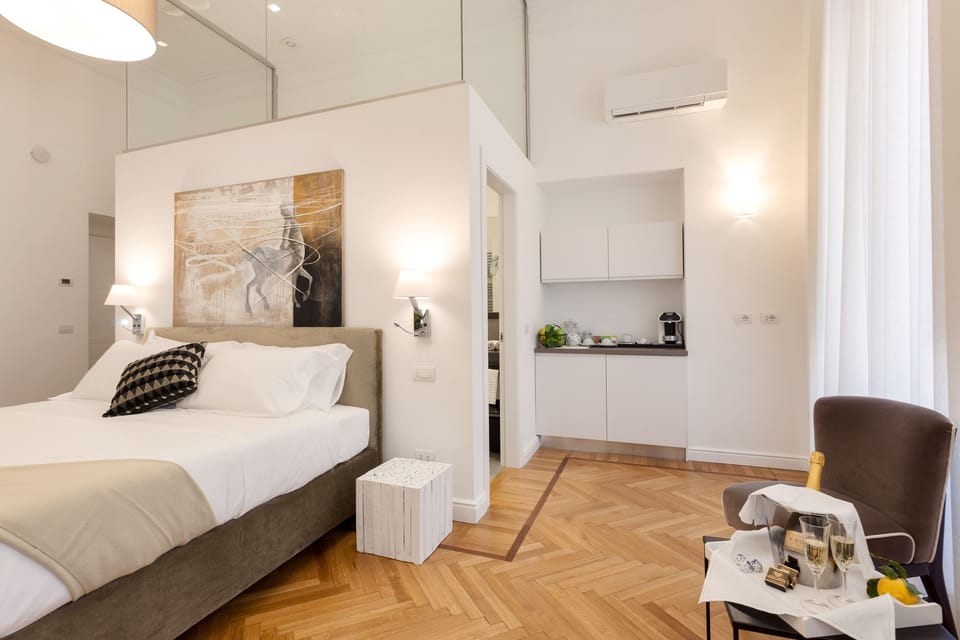 Premium bedding, down comforters, minibar, in-room safe