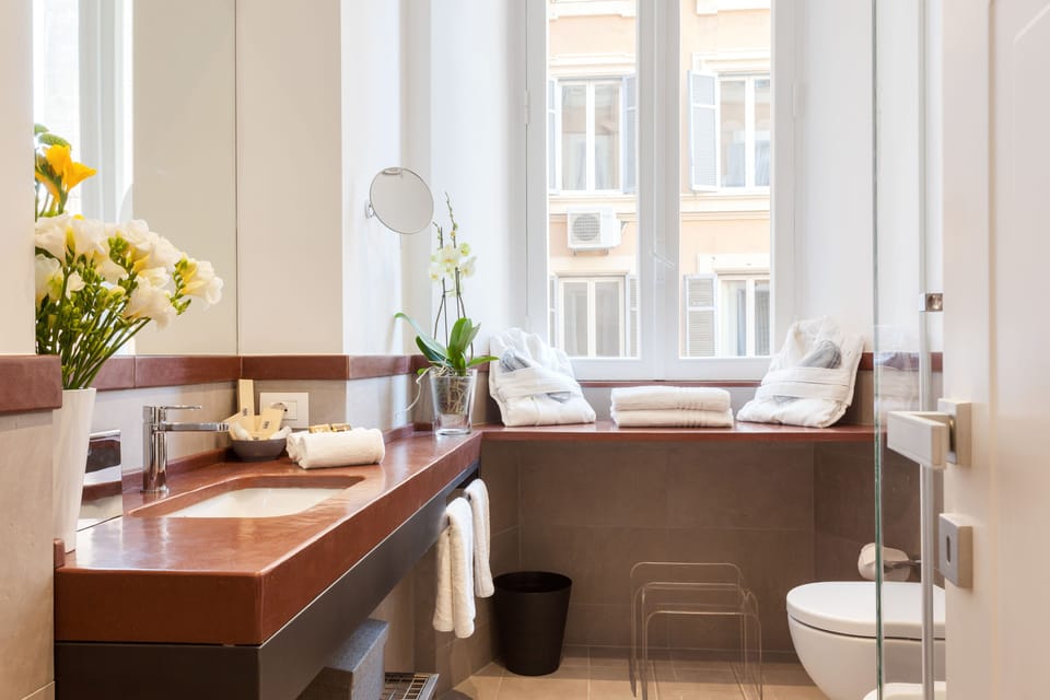 Double Room, 1 Bedroom | Bathroom | Rainfall showerhead, designer toiletries, hair dryer, bathrobes