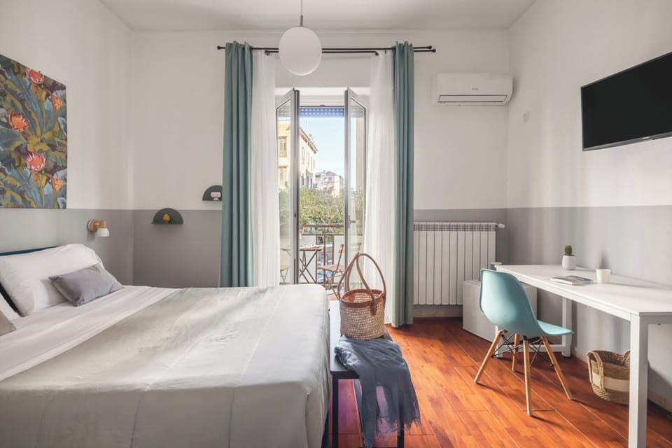 Deluxe Double Room, Balcony | Minibar, in-room safe, individually decorated, individually furnished