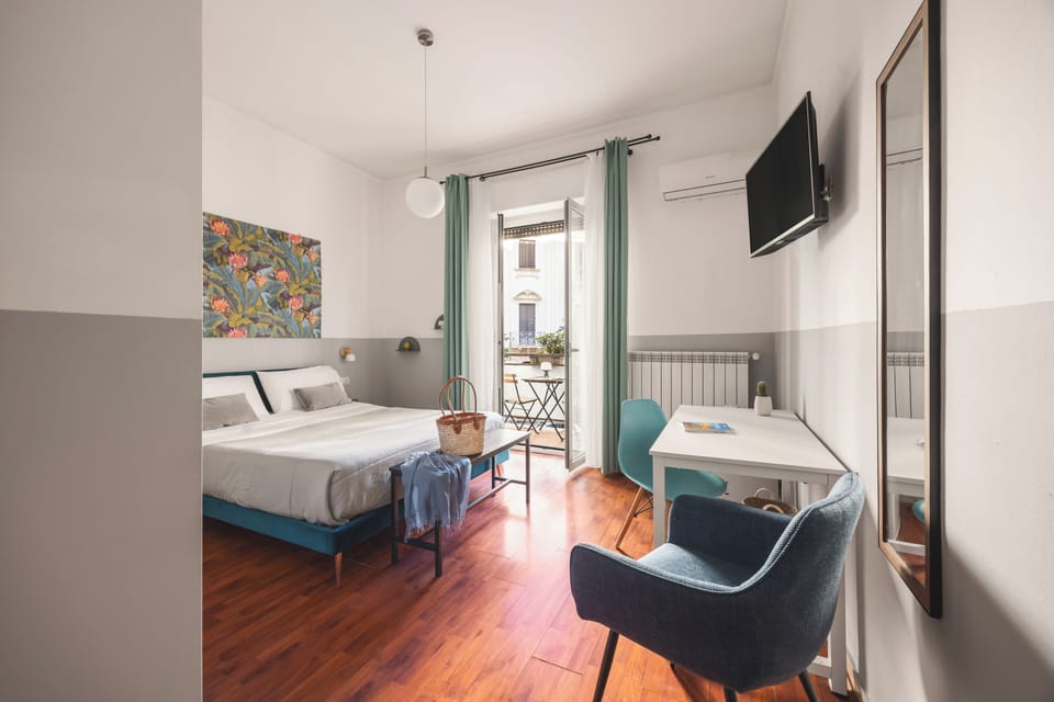 Deluxe Double Room, Balcony | Minibar, in-room safe, individually decorated, individually furnished