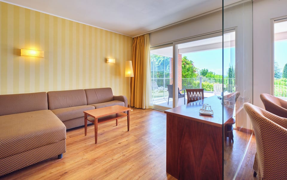 Family Suite, 2 Bedrooms, Non Smoking, Hill View | Down comforters, minibar, in-room safe, desk