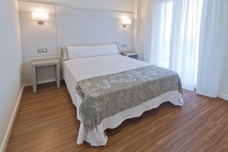2 bedrooms, laptop workspace, blackout drapes, iron/ironing board
