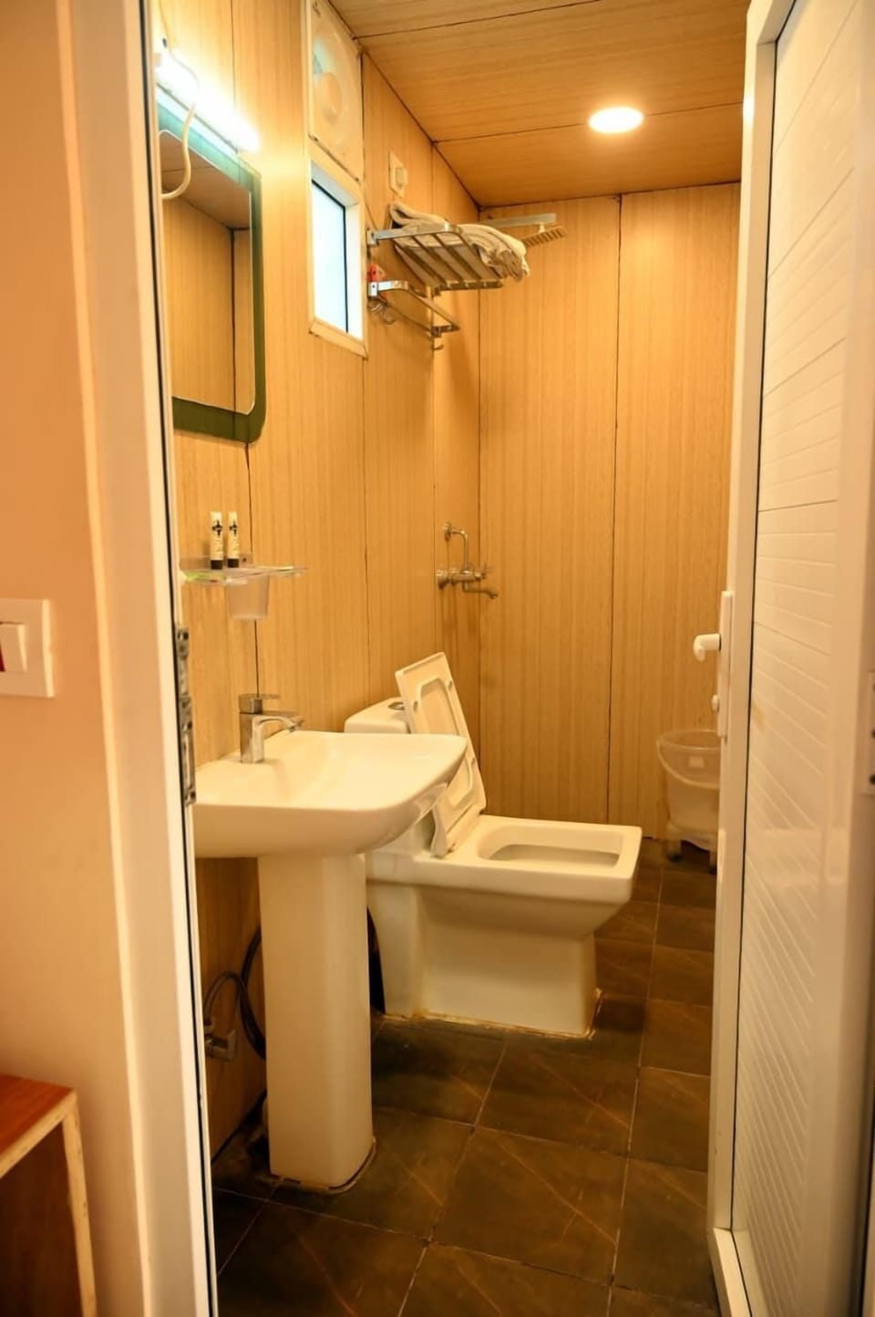 Shower, slippers, towels, soap