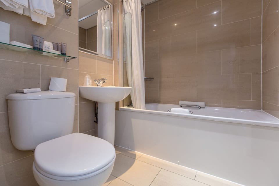 Shower, free toiletries, hair dryer, towels