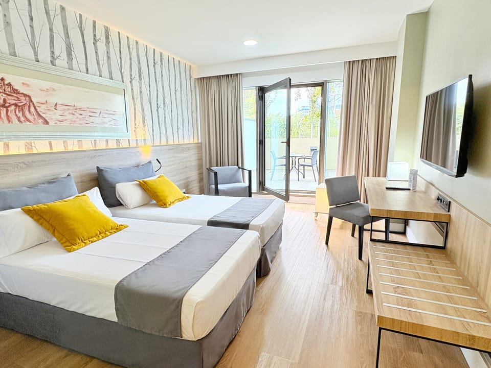 Superior Room, Terrace | Down comforters, in-room safe, desk, blackout drapes