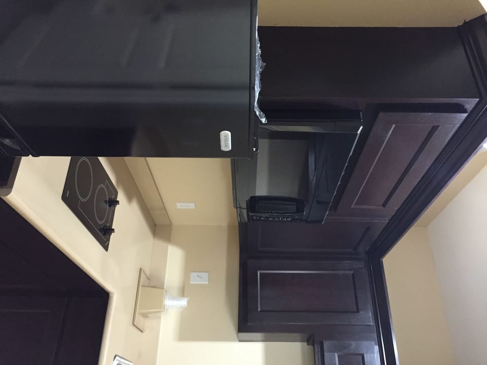 Double Room (2 Full Beds, Kitchenette) | Private kitchenette | Full-size fridge, microwave, cleaning supplies, freezer