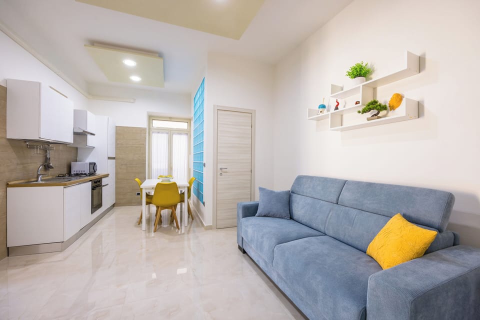 Luxury Apartment, City View | Living area | 55-inch LED TV with digital channels