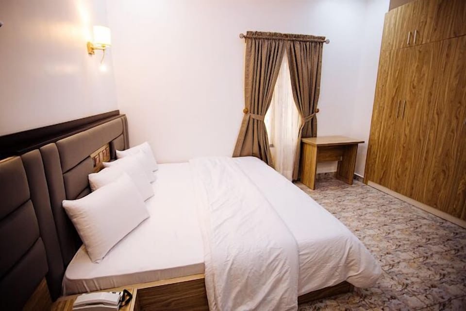 Family Room, Balcony, City View | Desk, laptop workspace, free WiFi