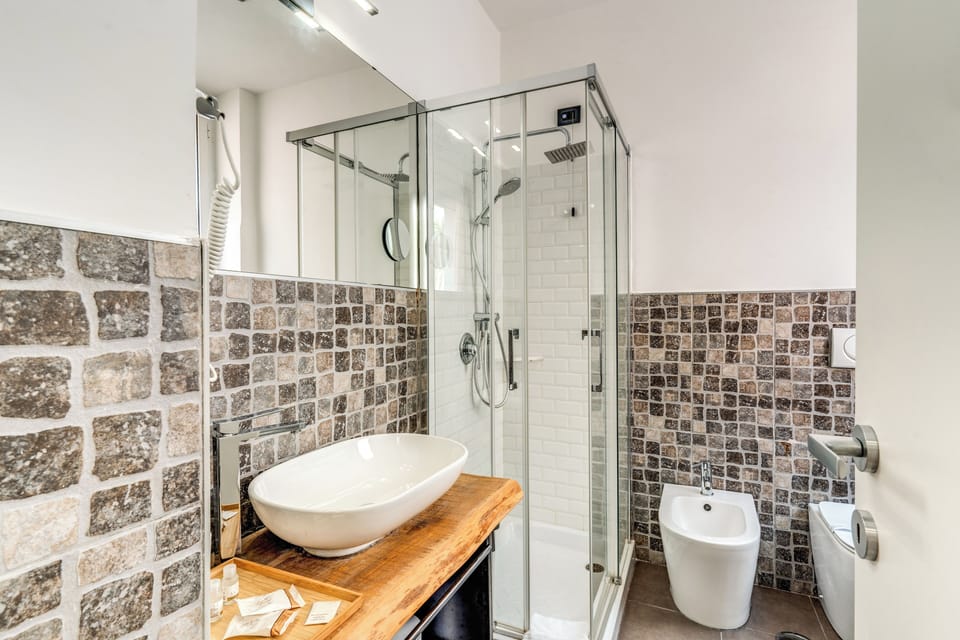 Shower, free toiletries, hair dryer, slippers