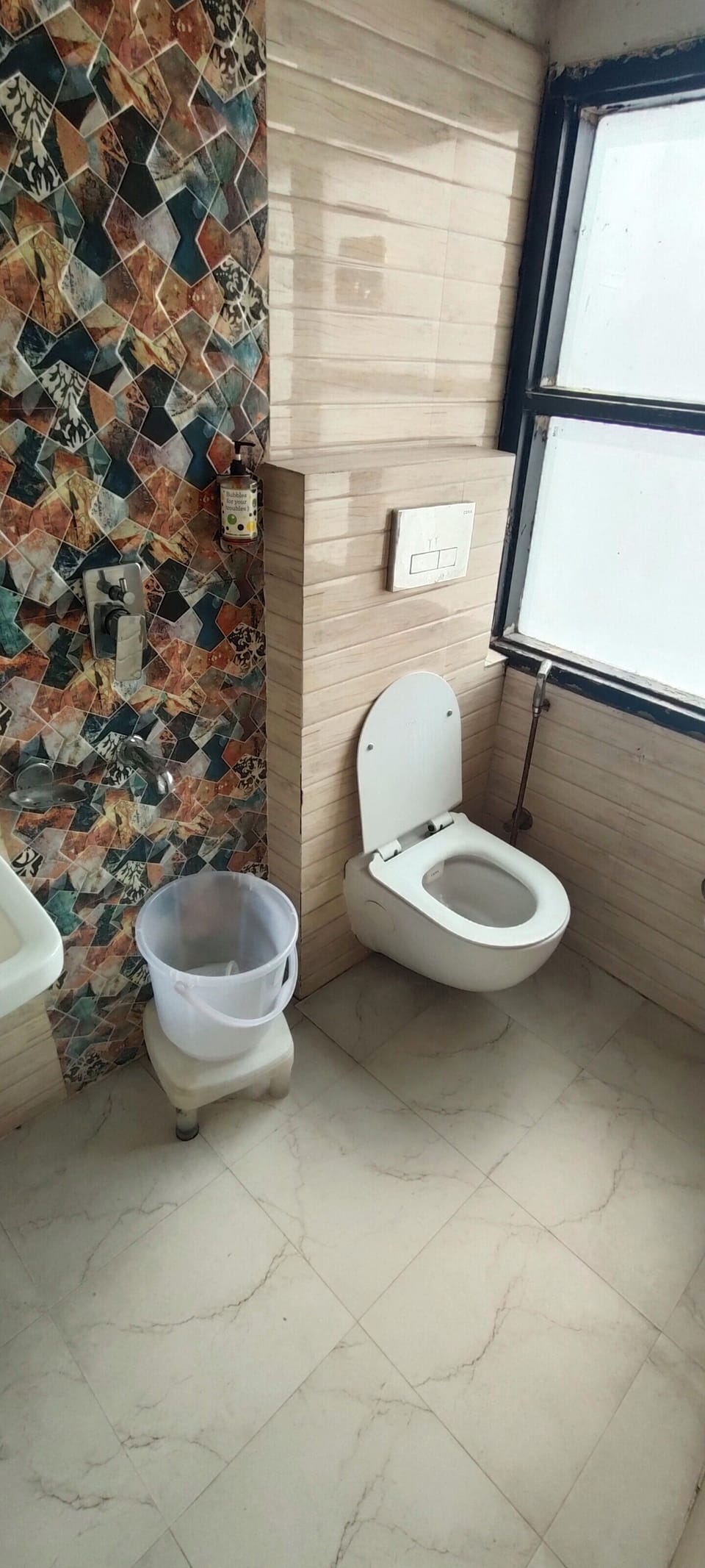 Shower, towels, soap, toilet paper