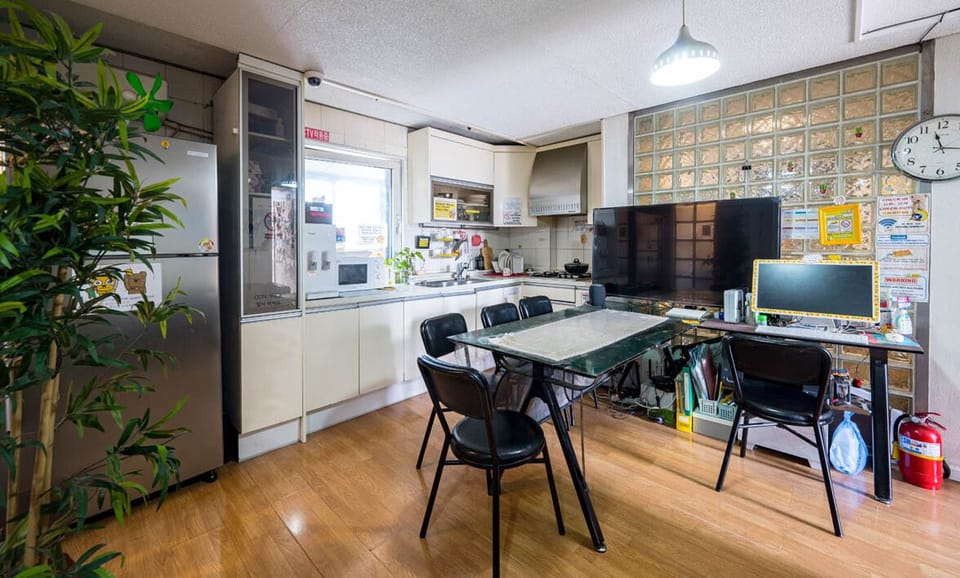 Mini-fridge, microwave, cookware/dishes/utensils, cleaning supplies