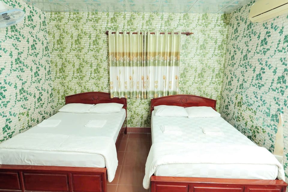 Standard Quadruple Room, City View | Iron/ironing board (on request), WiFi (free)