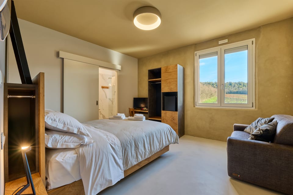 Junior Triple Room, Vineyard View | Desk, cribs (surcharge), WiFi (free), bed sheets