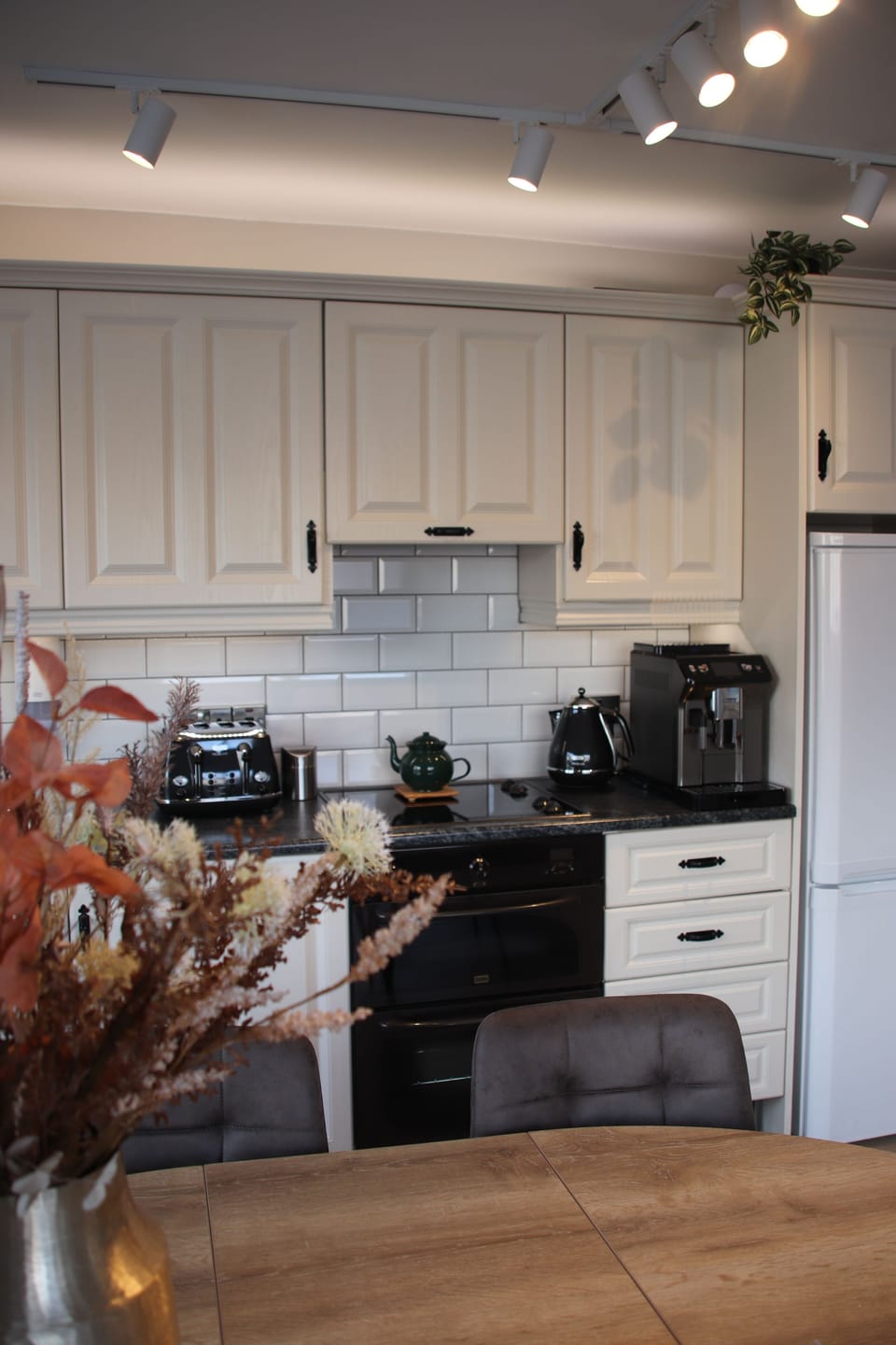 Espresso maker, coffee/tea maker, mini-fridge, shared microwave