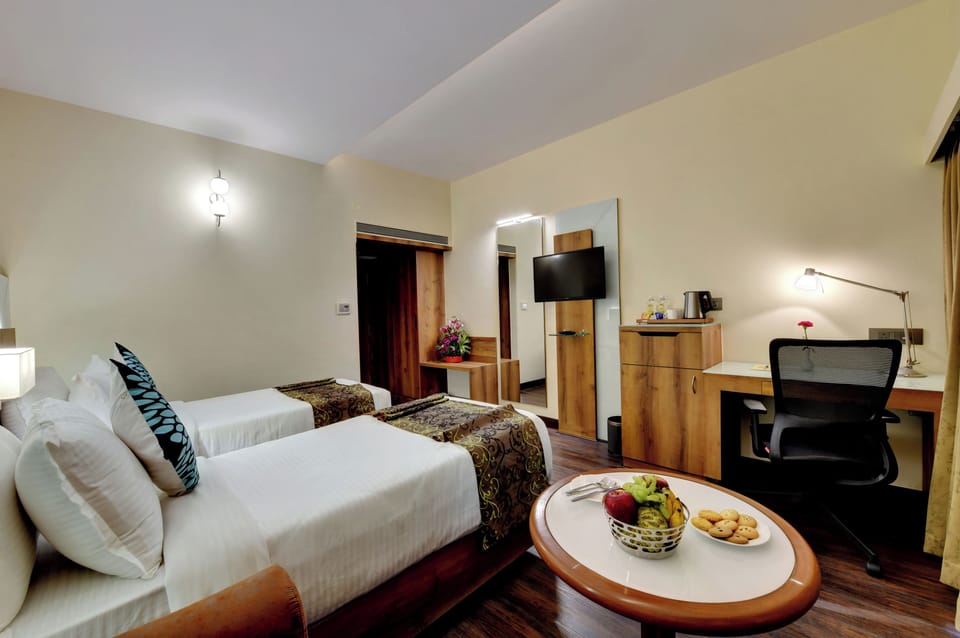 Premium Room | Minibar, in-room safe, laptop workspace, soundproofing