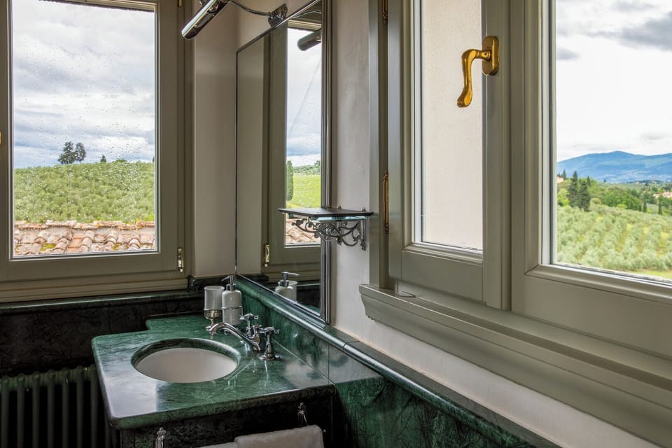 VILLA GHIRLANDAIO | Bathroom | Hair dryer, bathrobes, slippers, bidet