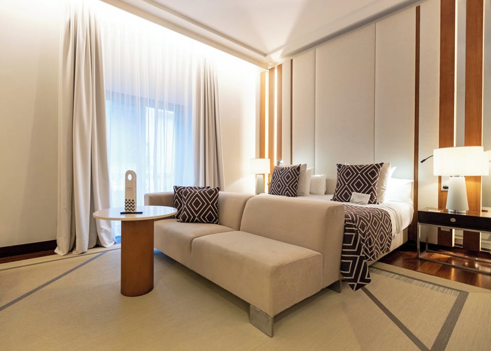 Premium bedding, down comforters, memory foam beds, minibar