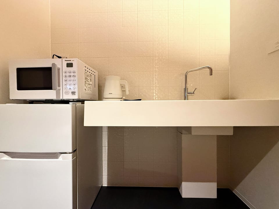 Deluxe Twin Room | Down comforters, desk, laptop workspace, WiFi (free)