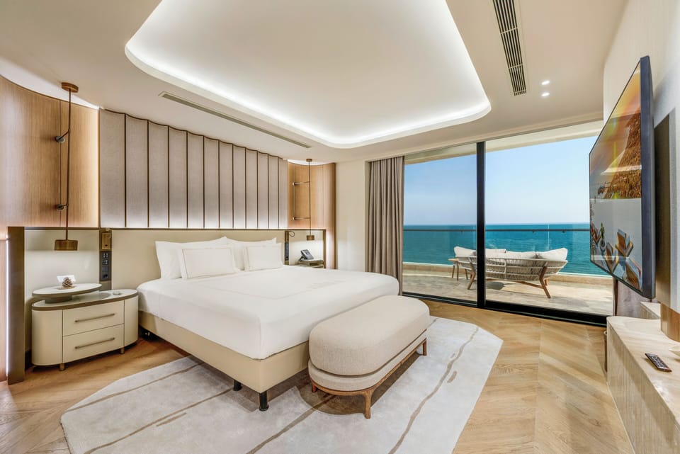 Crown Horizon Suite | Premium bedding, minibar, in-room safe, blackout drapes