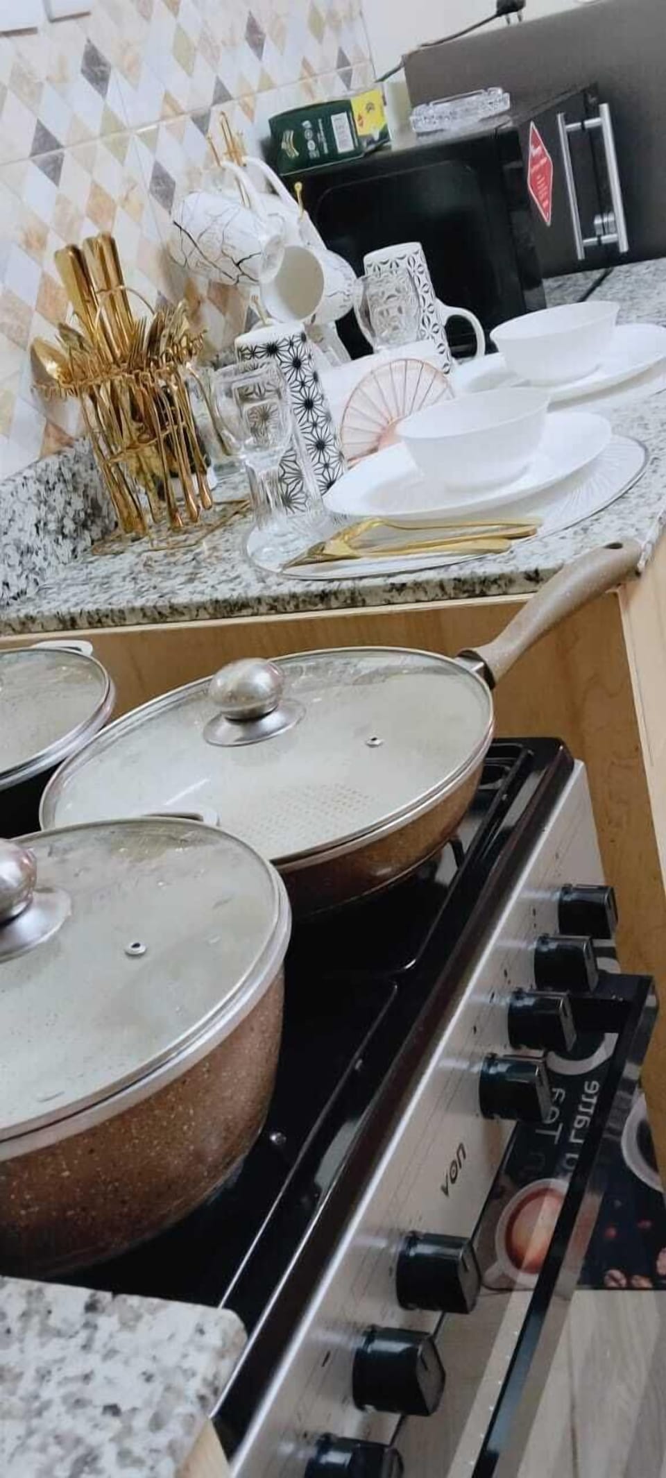 Deluxe Apartment, City View | Private kitchen | Fridge, microwave, cookware/dishes/utensils