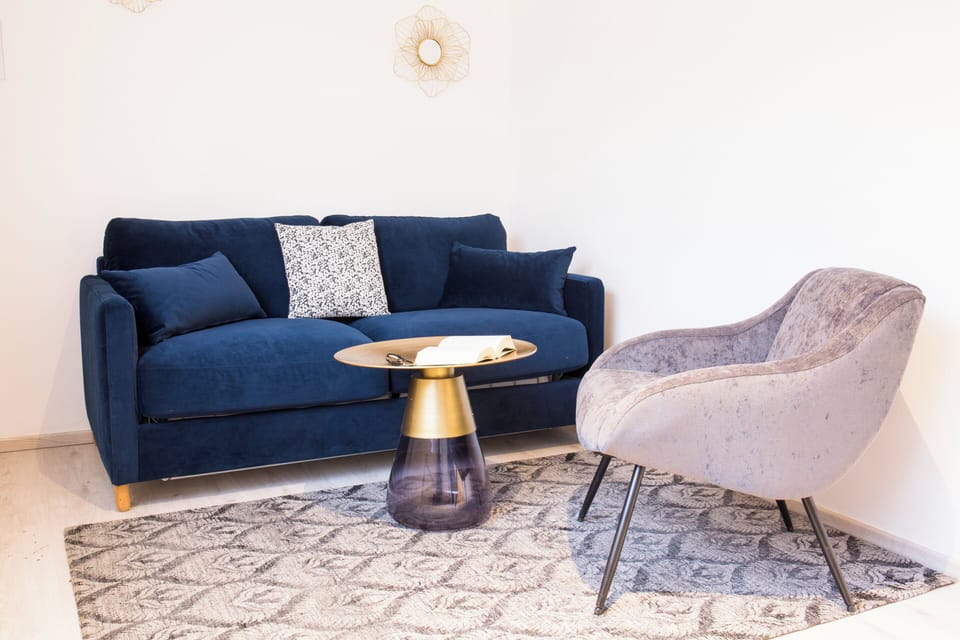 Comfort Quadruple Room | Living area