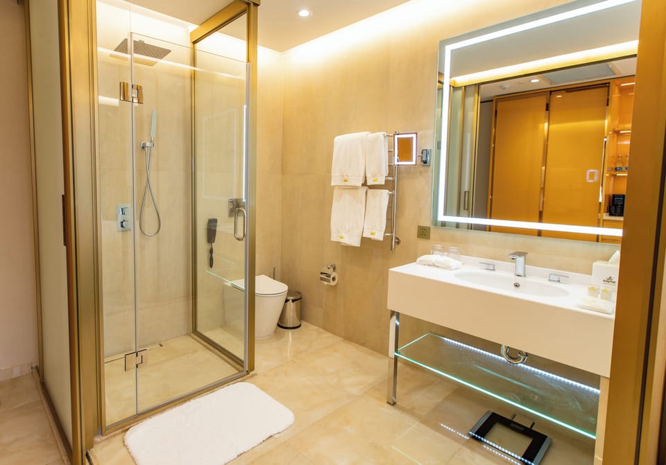 Shower, free toiletries, hair dryer, slippers