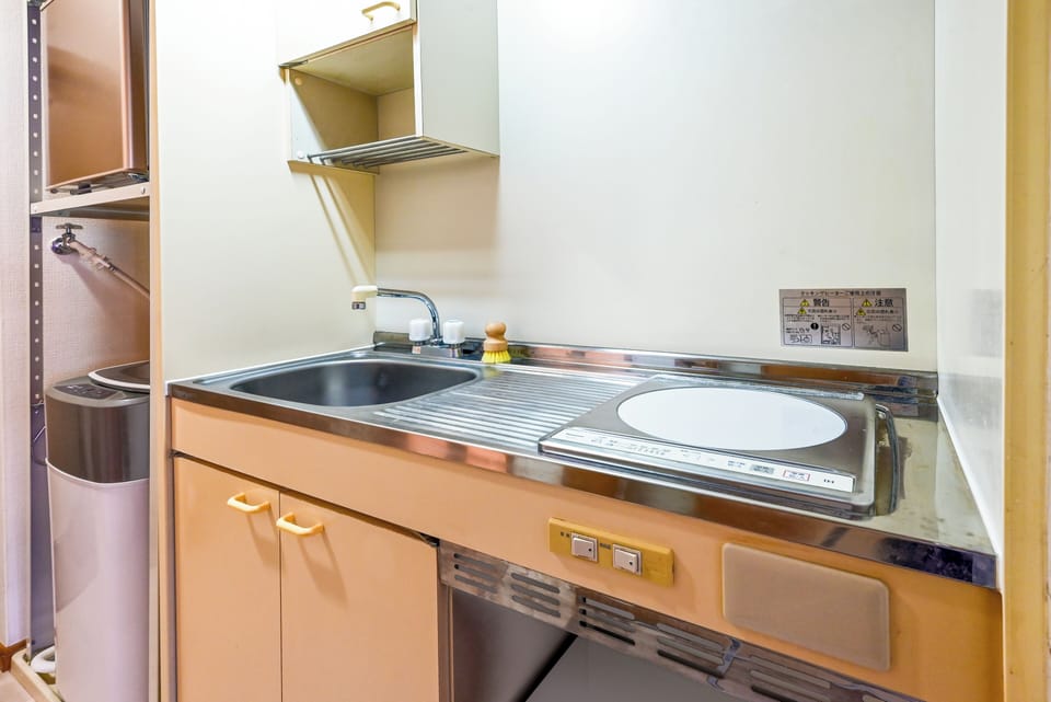 Apartment, 1 Queen Bed, Non Smoking (303) | Private kitchen | Mini-fridge, microwave, stovetop, cookware/dishes/utensils