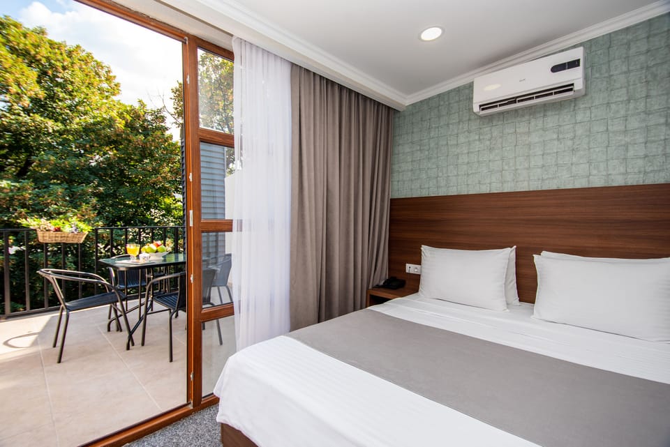 Family Room with Terrace | Hypo-allergenic bedding, minibar, in-room safe, desk