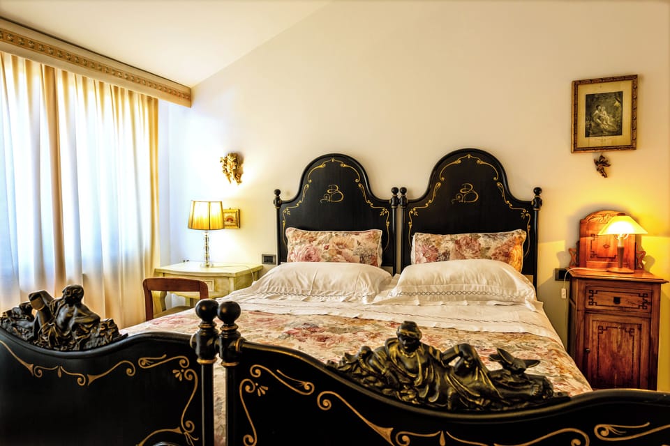 Deluxe Suite, 2 Bedrooms, Ensuite, Sea View | Frette Italian sheets, premium bedding, minibar, individually decorated