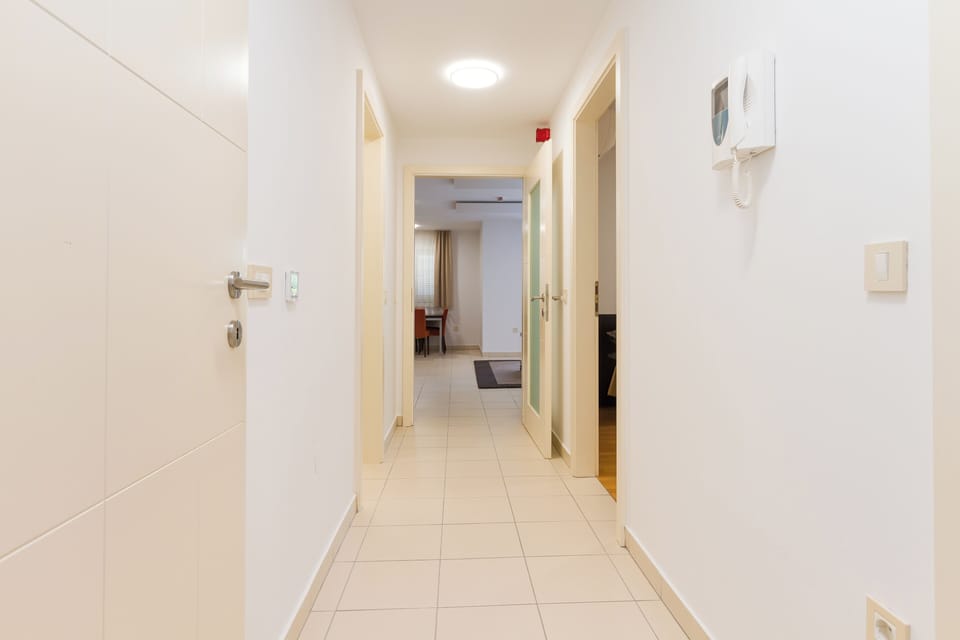 Family Apartment, 2 Bedrooms, Garden View | Living area | Flat-screen TV
