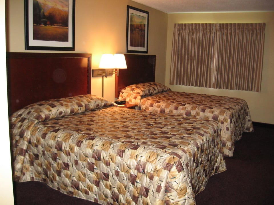 Standard Room, 2 Queen Beds | Pillowtop beds, desk, free cribs/infant beds, free rollaway beds