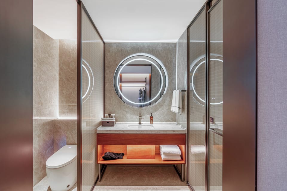 Shower, hair dryer, slippers, shampoo