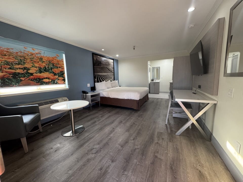 Standard Studio | Premium bedding, down comforters, desk, blackout drapes