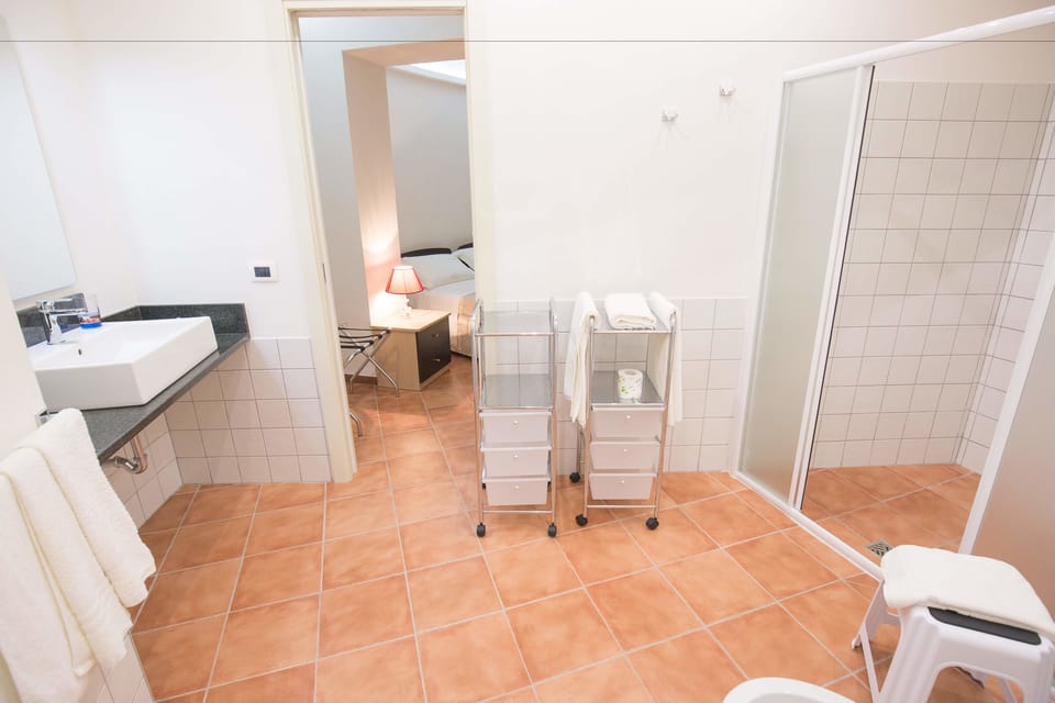 Superior Triple Room, 1 Bedroom | Bathroom | Shower, free toiletries, hair dryer, bidet