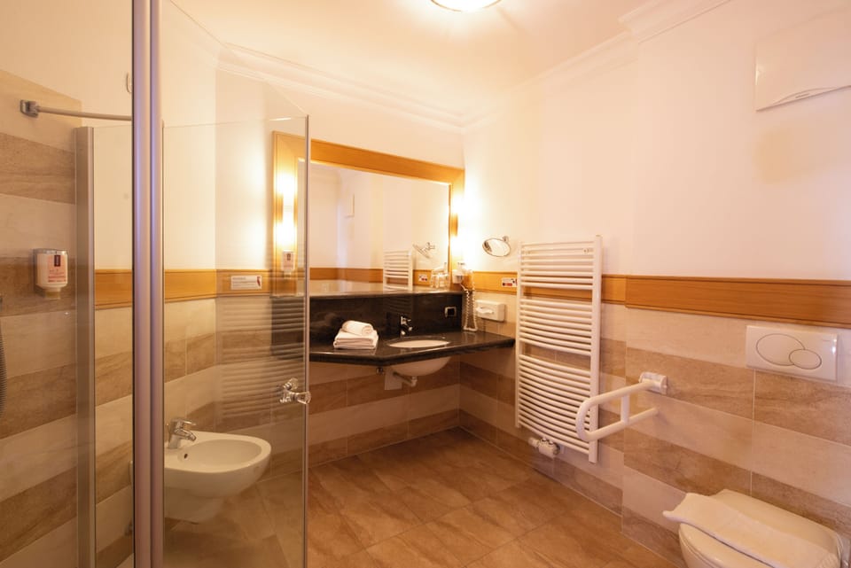 Standard Room (Gampen) | Bathroom | Hair dryer, bathrobes, towels, soap
