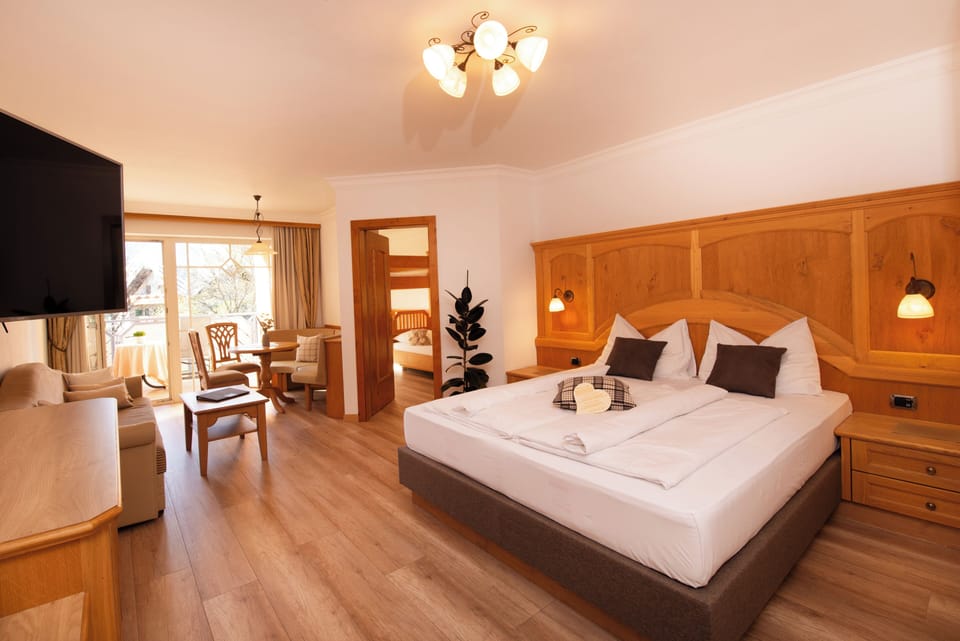 Family Suite, 2 Bedrooms | In-room safe, desk, free WiFi, bed sheets