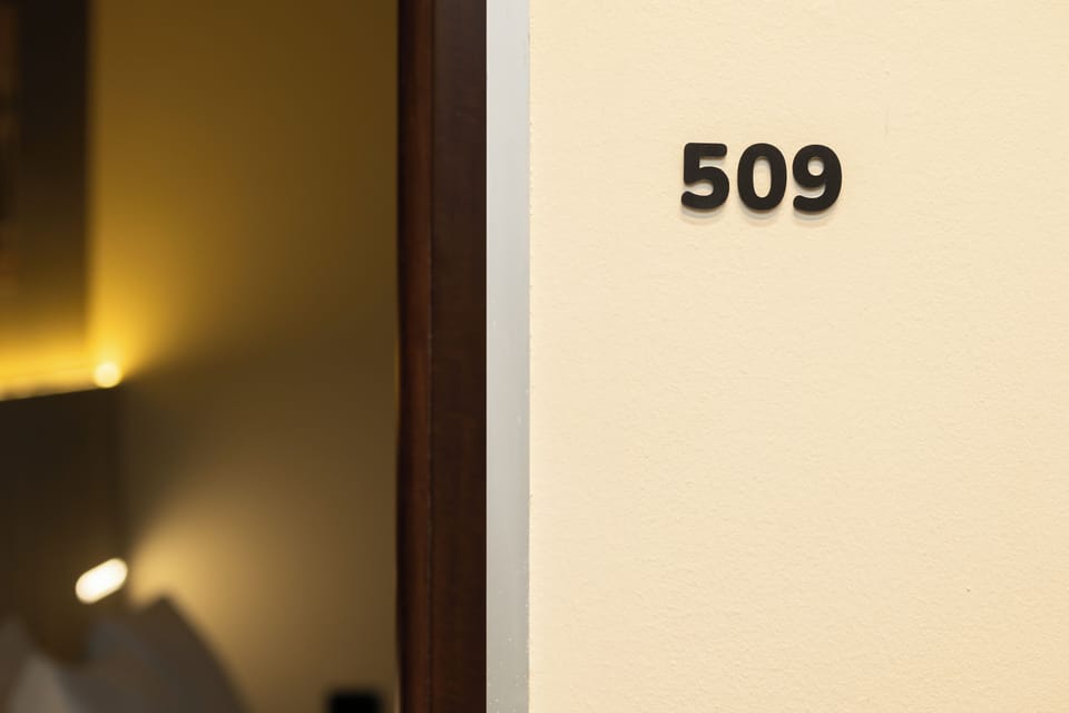 Family Quadruple Room | In-room safe, desk, laptop workspace, iron/ironing board