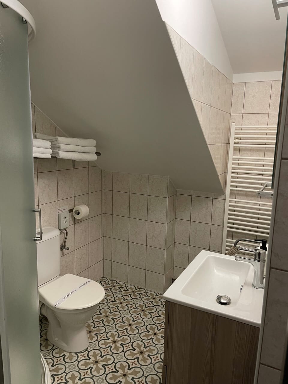 Shower, free toiletries, hair dryer, towels