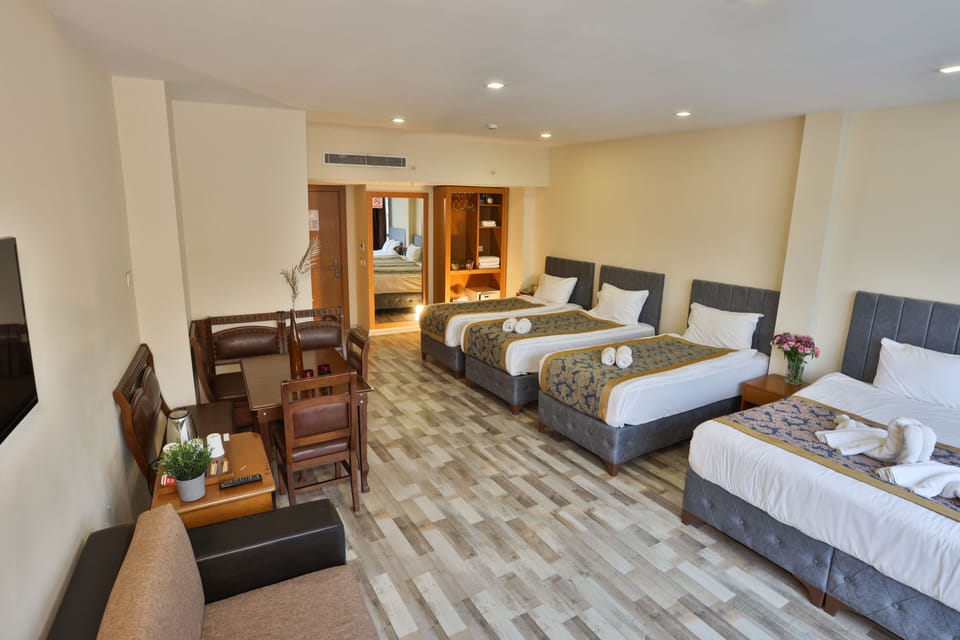 Family Room | Minibar, in-room safe, blackout drapes, soundproofing