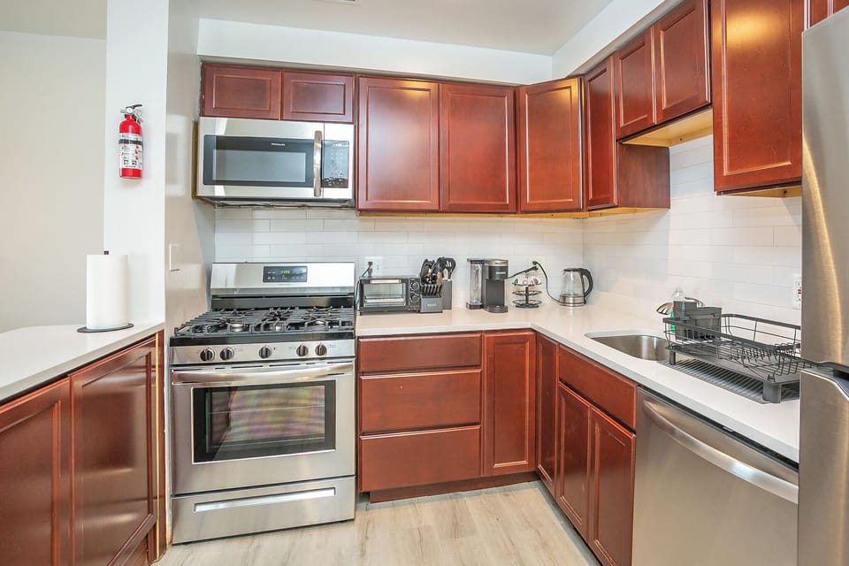 Comfort Apartment, Balcony | Private kitchen | Coffee/tea maker, electric kettle, dining tables