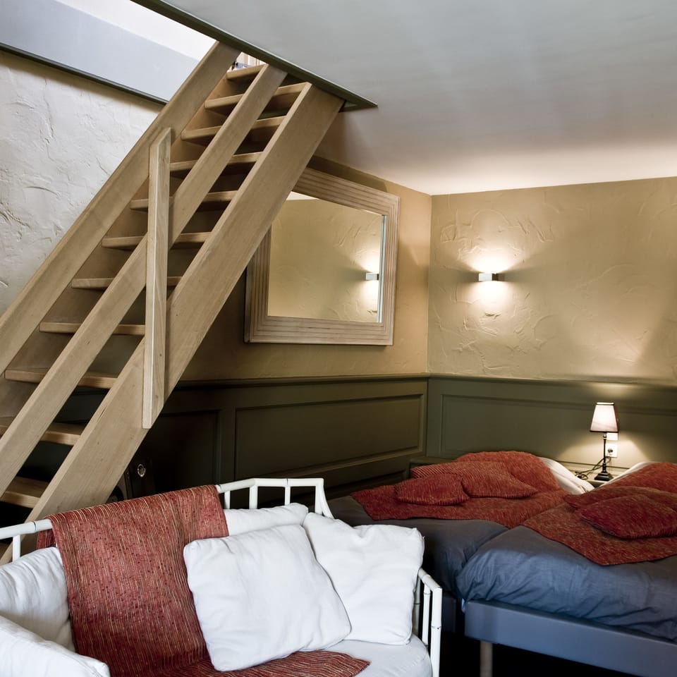 Deluxe Suite | In-room safe, individually decorated, iron/ironing board