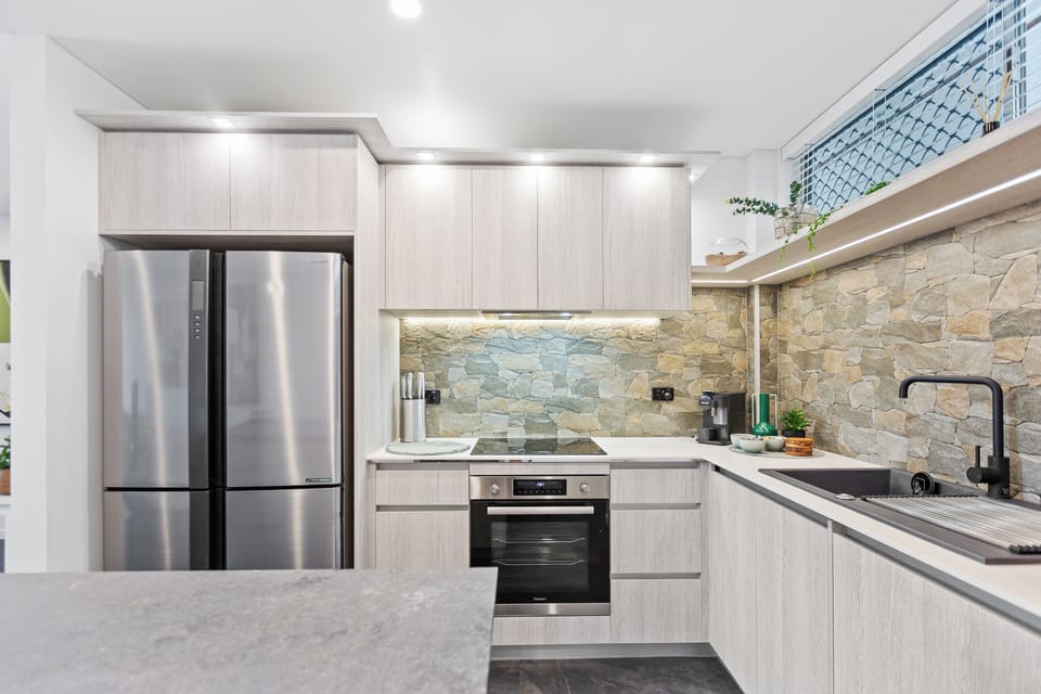 Deluxe Apartment, Balcony, Beach View | Private kitchen | Full-size fridge, microwave, oven, stovetop