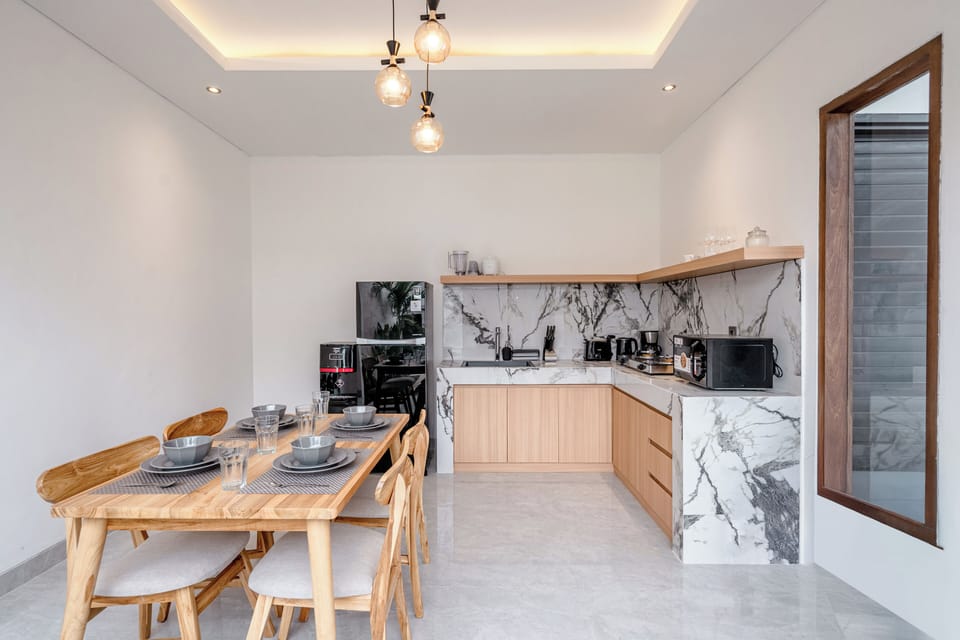 Deluxe Villa, 2 Bedrooms | Private kitchen | Coffee/tea maker, electric kettle, toaster, highchair